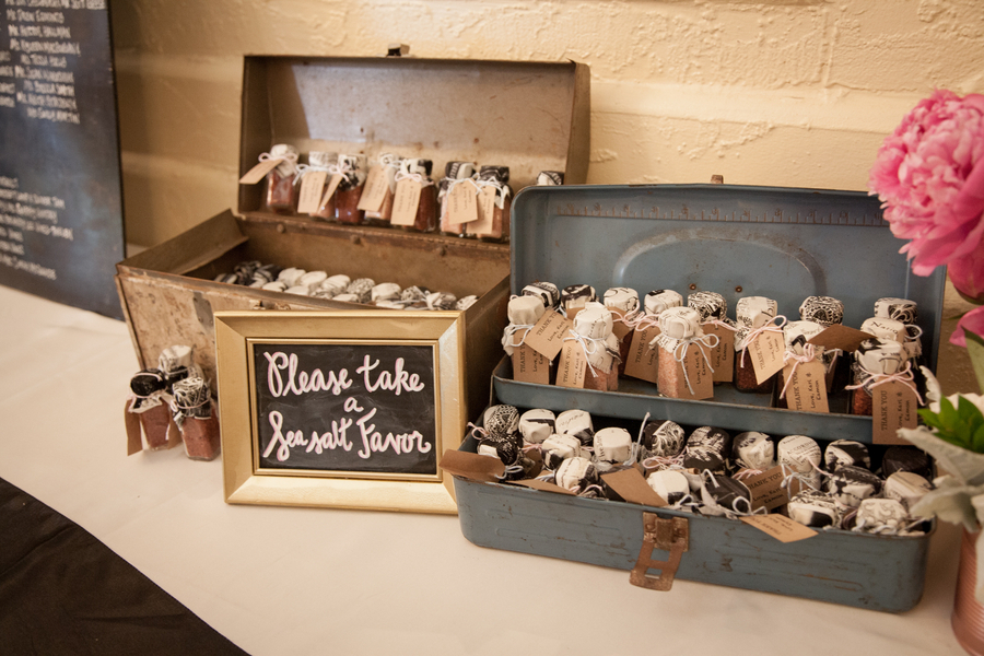 Homemade sea salt favors packaged in cute clothtopped bottles and